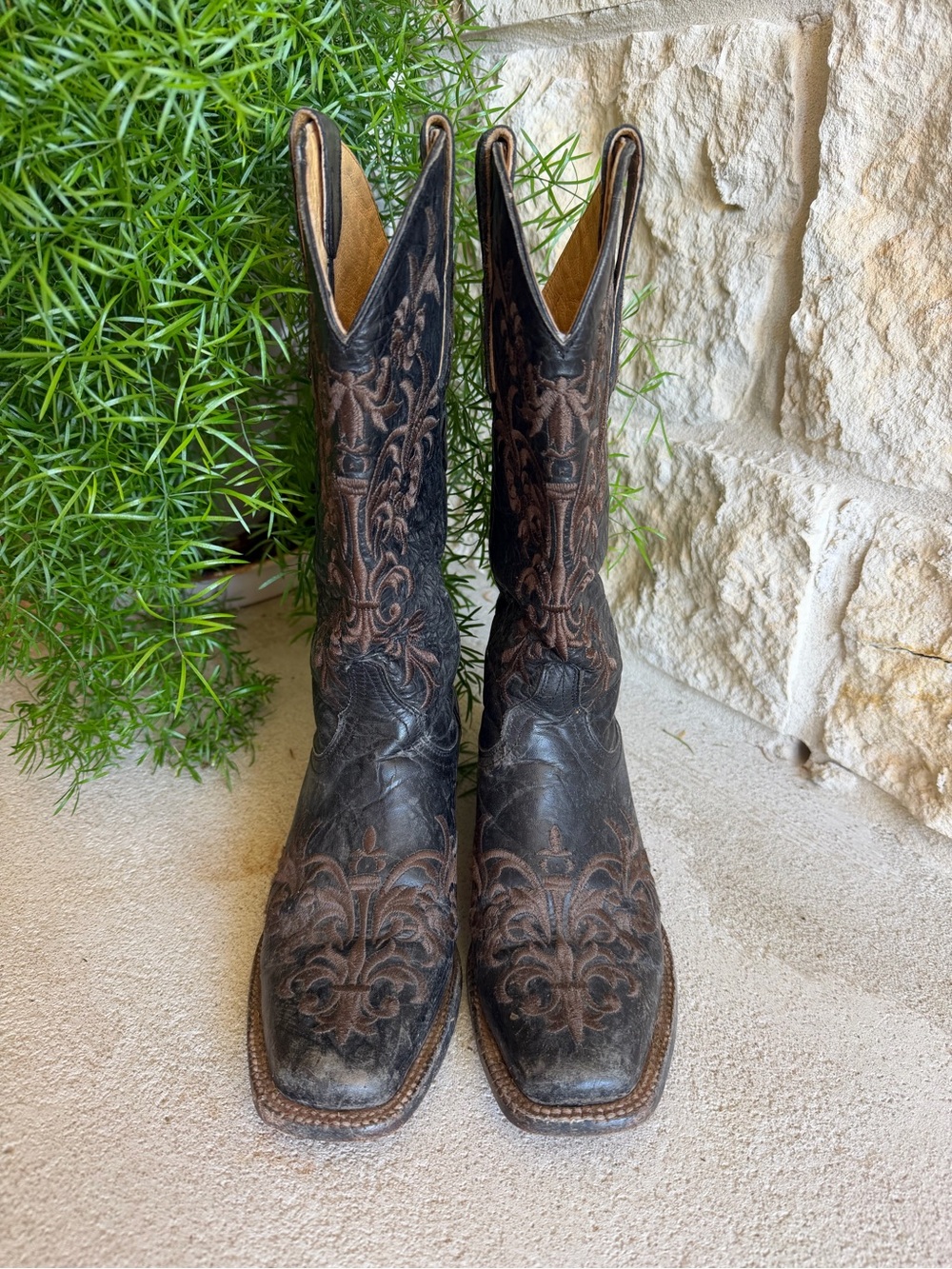Cavender’s ladies black boots with brown embroidery.